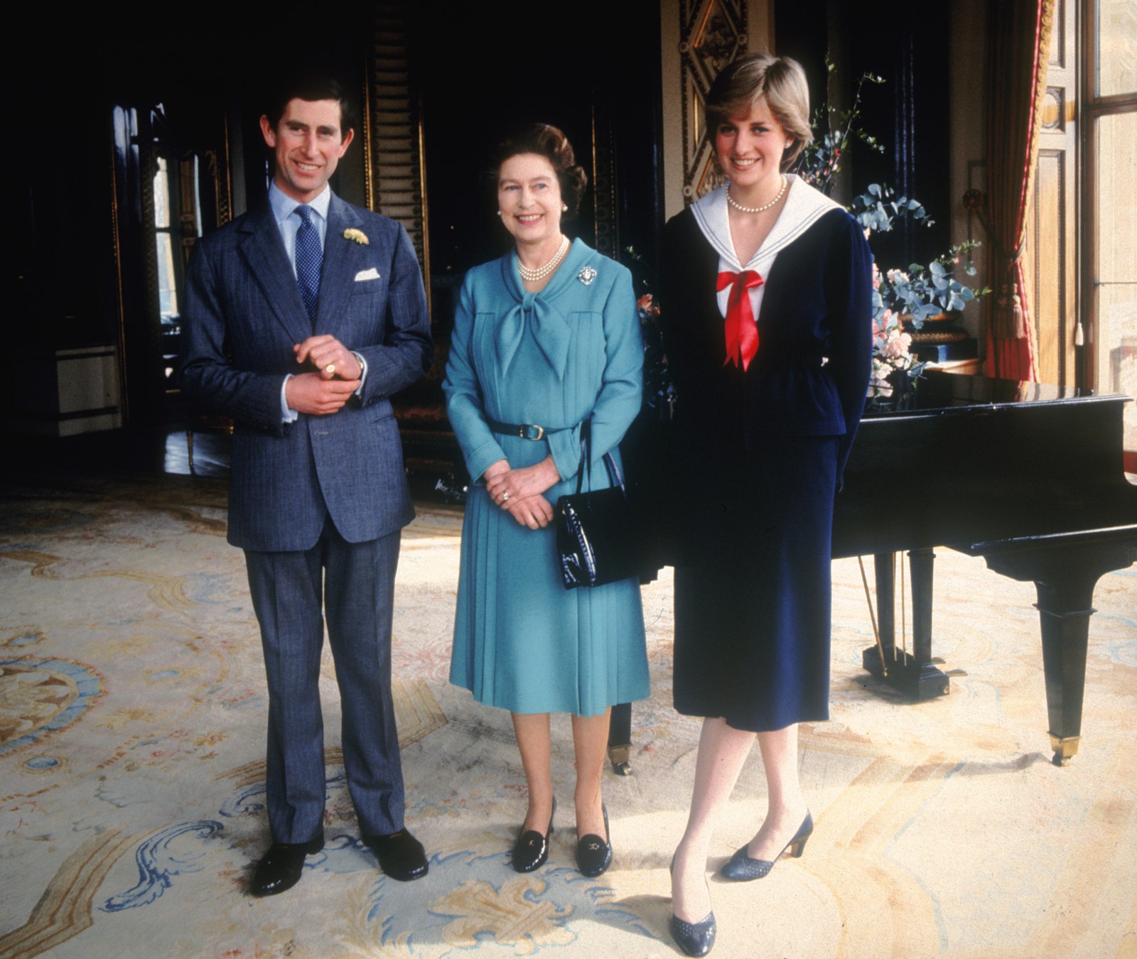 Принц Чарльз Елизавета II и принцесса Диана в Букингемском дворце 1981