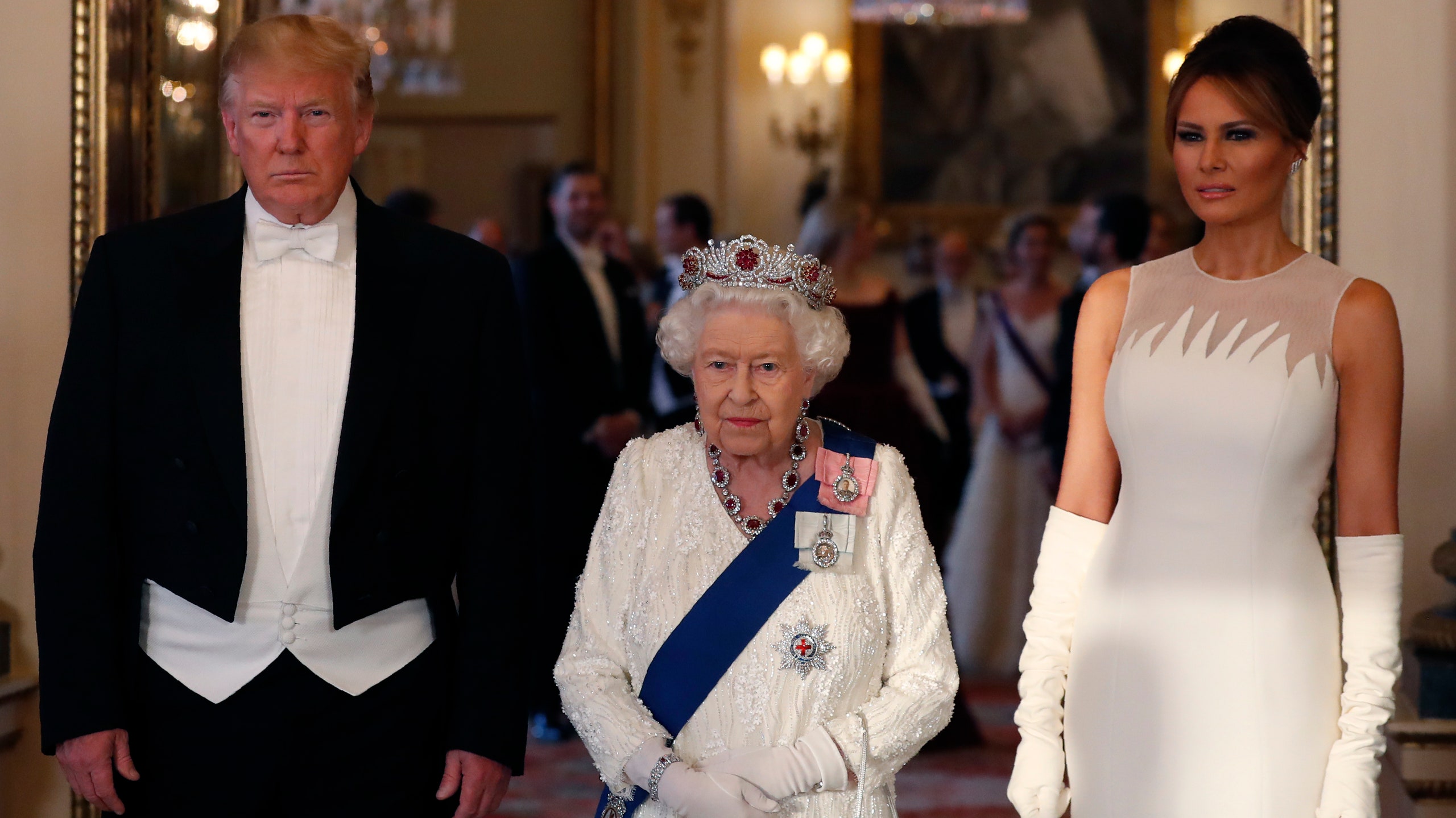 Дональд и Мелания Трамп на приеме в Букингемском дворце