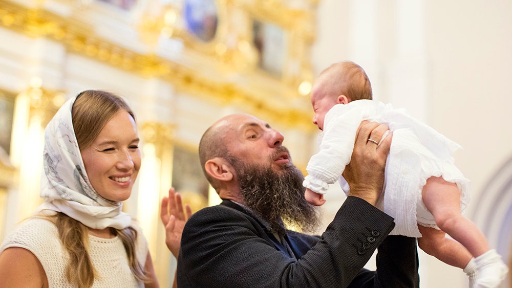 Ида и Владимир Кехман с дочерью Анастасией фото с крестин в храме