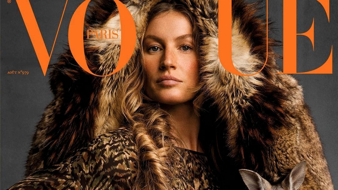 Жизель Бундхен на обложке французского Vogue в шубе и с кенгуру