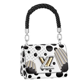 Кожаная сумка с отделкой из металла 234 000 руб. Louis Vuitton.