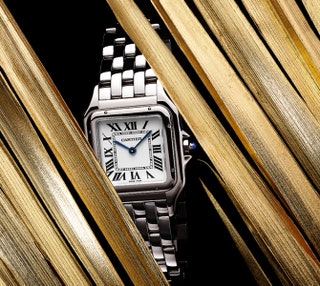 Часы Panthere de Cartier из стали с заводной головкой с синей синтетической шпинелью.