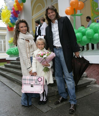 Первый раз в первый класс маленькая Стефания Маликова с  мамой Еленой и папой Дмитрием.