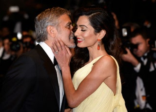 Амаль и Джордж Клуни на Каннском кинофестивале .