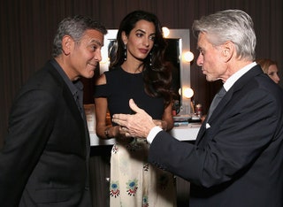 Джордж и Амаль Клуни и Майкл Дуглас.