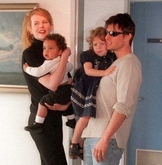 Николь Кидман и Том Круз с приемными детьми Изабеллой и Коннором .