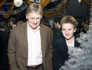 Дмитрий Песков с сыном Микой.