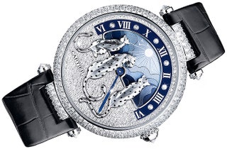 Часы Reves de Pantheres  из белого золота с бриллиантами от Cartier.