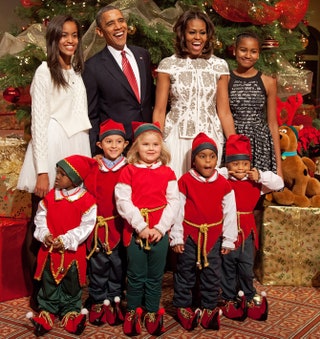 Барак и Мишель Обама с детьми.