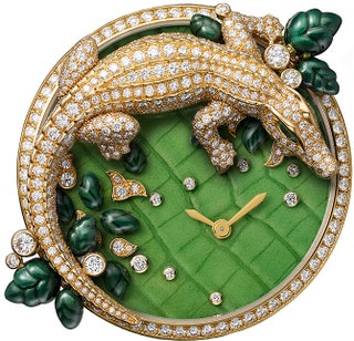 Часы Les Indomptables de Cartier с крокодилом на циферблате.