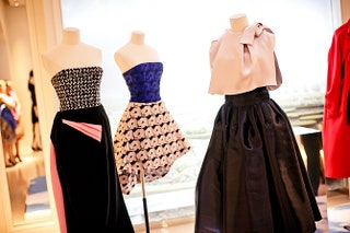 Платья Dior в бутике бренда в ГУМе где перед показом состоялся праздничный коктейль.