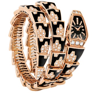 Часы Serpenti от Bulgari из розового золота украшенные бриллиантами и черной эмалью.