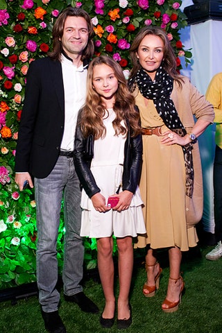 Дмитрий и Елена Маликовы с дочерью.