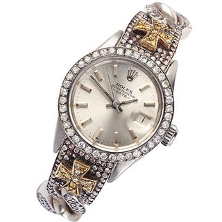 Часы Rolex в ювелирной обработке Loree Rodkin.