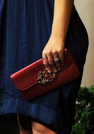 Клатч Dior в руках Натали.